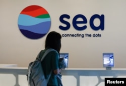 虾皮的母公司是新加坡电商和网游公司冬海集团(Sea Group)。（2021年3月5日）