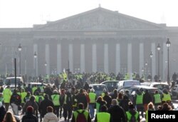"Yellow Vest" protesters are seen gathered near the National Assembly in Paris, France, Nov. 17, 2018.