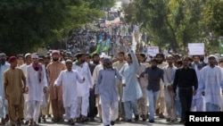  Protesters shout slogans as they march towards the U.S. Embassy during an anti-America rally in Islamabad, September 21, 2012..