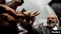 Brazil's former president Luiz Inacio Lula da Silva attends a rally in the northeastern city of Lagarto in Sergipe, Brazil, Aug. 21, 2017. 