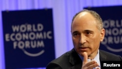 FILE - Chief Executive Officer of Novartis Joseph Jimenez speaks during a session at the World Economic Forum in Davos Jan. 25, 2014.