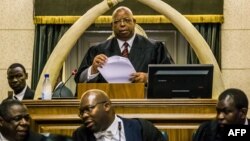 FILE: Zimbabwe Speaker of Parliament Jacob Mudenda presides over a parliament session where a motion is moved to impeach President Robert Mugabe, Nov. 21, 2017 at the Zimbabwean Parliament in Harare, Zimbabwe.