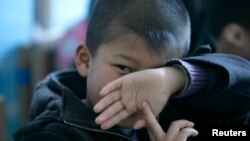Bé trai bị hội chứng tự kỷ ở Bắc Kinh, Trung Quốc. (Ảnh tư liệu)