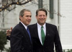 FILE - President-elect Bush meets with Vice President Gore at Gore's official residence in Washington, Tuesday, Dec. 19, 2000. (AP Photo/J. Scott Applewhite)