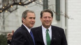 FILE - President-elect Bush meets with Vice President Gore at Gore's official residence in Washington, Tuesday, Dec. 19, 2000. (AP Photo/J. Scott Applewhite)
