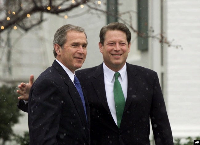 FILE - The 2000 election, between George Bush (left) and Al Gore, was the closest race since 1876. (AP Photo/J. Scott Applewhite)