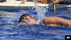 Endurance swimmer Diana Nyad swims in the Florida Straits between Cuba and the Florida Keys, Aug. 19, 2012.