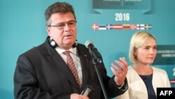 FILE - Lithuania's Foreign Minister Linas Linkevicius (L) during a press conference after the Baltic and Nordic Foreign Ministers meeting in Riga, Latvia, Aug. 26, 2016. 