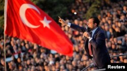 Newly elected Mayor of Istanbul Ekrem Imamoglu addresses his supporters outside the City Hall in Istanbul, Turkey, April 17, 2019. 