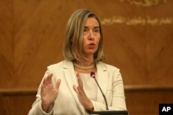 FILE - EU High Representative for Foreign Affairs and Security Policy Federica Mogherini gives a press conference in Amman, Jordan, June 10, 2018.