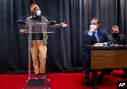 FILE - American journalist Danny Fenster speaks at a news conference in New York, Nov. 16, 2021, after arriving in the United States following a six-month detention in Myanmar.