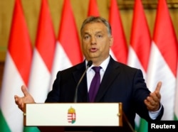 FILE - Hungarian Prime Minister Viktor Orban attends a news conference in Budapest, Hungary, Oct. 4, 2016.