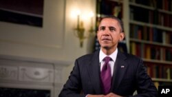 US President Barack Obama records the weekly address, 15 Oct 2010