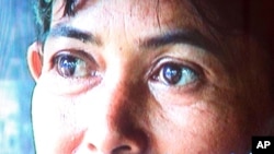 Tang Kim is seen in this image taken from a documentary by Rachana Phat titled "The Khmer Rouge rice fields, the story of rape survivor Tang Kim" in Phnom Penh Wednesday, Aug. 18, 2004 before she became a nun. The film, produced by Youk Chhang of the Docu