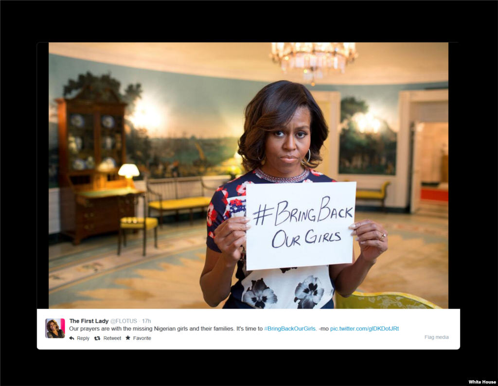 The White House posts a Twitter photo showing First Lady Michelle Obama holding a sign with hashtag #BringBackOurGirls, May 7, 2014.