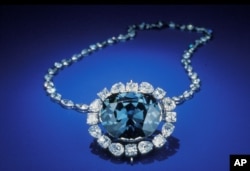 FILE - In this photo from the Smithsonian Institution, the Hope Diamond is seen in Washington. (AP Photo/Smithsonian Institution, Dane Penland)