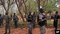 Malian soldiers mill around inside the milirary camp of Malian junta leader Amadou Sanogo in Kati near Bamako on March 30, 2012.