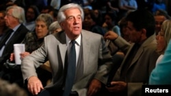 Tabare Vazquez, presidential candidate for the ruling Frente Amplio, gestures before giving his speech to supporters in Montevideo, Uruguay, Nov. 7, 2014.