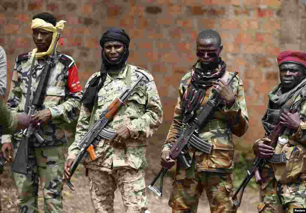 SELEKA&nbsp; &nbsp;Conservation experts report evidence that non-state militias of Seleka forces recently killed at least 26 elephants in Central African Republic&#39;s Sangha Mbaere reserve. Armed fighters face a photographer at a Seleka base in Bambari on May 31, 2014.