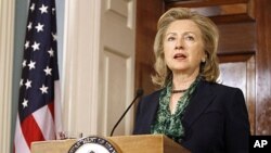 Secretary of State Hillary Clinton makes a statement regarding the death of Osama bin Laden, May 2, 2011, at the State Department in Washington