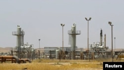 FILE - A view shows the Bai Hassan oilfield northwest of Kirkuk, July 12, 2014.