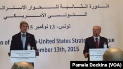 U.S. Secretary of State John Kerry, left, and Tunisian Foreign Minister Taieb Baccouche speak to reportersTunis, Tunisia, Nov. 13, 2015. 