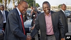 Presiden Kenya Uhuru Kenyatta (kiri) dan Wakil Presiden William Ruto di Nairobi, Kenya (12/10). 