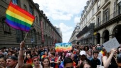 Participants take part in the annual Gay Pride parade in Paris, France June 24, 2017.