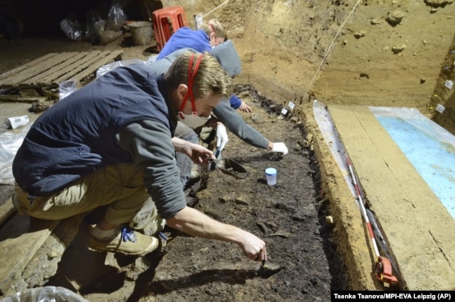 This image provided by Tsenka Tsanova in May 2020 shows excavation work at the Bacho Kiro Cave in Bulgaria.