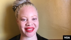 Zimbabwean journalist Candice Mwakalyelye, who is half-Tanzanian, says education plays a key role in reducing discrimination and violence against albinos. (S. Mhofu/VOA)