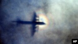 Tư liệu- Một chiếc máy bay P3 Orion của Không lực Hoàng gia New Zealand trên đường tìm kiếm chiếc máy bay mất tích MH 370. 