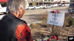 Laura Spaeth visits a memorial honoring slain U.S. hostage Kayla Mueller at the courthouse plaza in Prescott, Arizona, Feb. 10, 2015. 