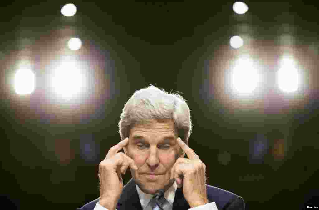 Secretary of State John Kerry testifies at a Senate Foreign Relations Committee hearing on "U.S. Strategy to Defeat the Islamic State in Iraq and the Levant" on Capitol Hill in Washington September 17, 2014. REUTERS/Joshua Roberts (UNITED STATES -