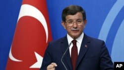 Turkish Prime Minister Ahmet Davutoglu speaks to the media at the headquarters of his ruling Justice and Development Party, AKP, in Ankara, May 5, 2016. 