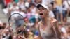 Wozniacki Kalahkan Sharapova, Maju ke Perempat Final