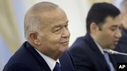 FILE - Uzbek President Islam Karimov is pictured during his meeting with U.S. Secretary of State John Kerry at the Palace of Forums in Samarkand, Uzbekistan, Nov. 1, 2015. 