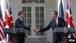 Presiden Barack Obama dan PM Inggris David Cameron dalam konferensi pers bersama di Gedung Putih (14/3).