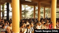 Tibetans Praying at Tsunglagkhang in Dharamsala