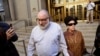 Convicted spy Jonathan Pollard and his wife, Esther, leave the federal courthouse in New York, Nov. 20, 2015.