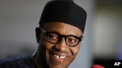 Nigerian former Gen. Muhammadu Buhari speaks to journalists in Abuja, Nigeria, Wednesday, April 1, 2015. 