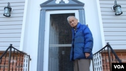 Gerardo Tan, pictured at his Maryland home, is still waiting for compensation that was promised to him for serving as a Filipino soldier during World War II when the Philippines was a U.S. territory. (I. Basco/VOA)
