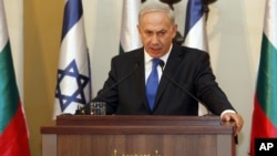 Israeli Prime Minister Benjamin Netanyahu speaks during a joint press conference with his Bulgarian counterpart, Boyko Borissov, not seen, in Jerusalem, Tuesday, Sept. 11, 2012.