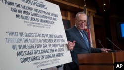 Senate Minority Leader Chuck Schumer, D-N.Y., holds a news conference to talk about the Democratic victory in the Alabama special election and to discuss the Republican tax bill in Washington, Dec. 13, 2017.