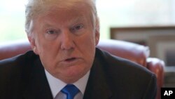 Republican presidential candidate Donald Trump speaks during an interview with The Associated Press in his office at Trump Tower, May 10, 2016, in New York. 