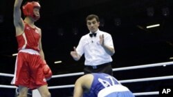 Olimpiadadakı qalmaqallı boks döyüş fotolarda