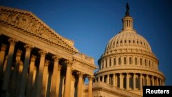 FILE - The U.S. Capitol Building is seen at sunrise in Washington, Nov. 17, 2008.