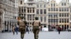 Belgian soldiers patrol in the Grand Place of Brussels following Tuesday's bombings in Brussels, Belgium, March 24, 2016. 