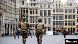 Belgian soldiers patrol in the Grand Place of Brussels following Tuesday's bombings in Brussels, Belgium, March 24, 2016. 