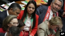 Ruling party lawmakers react after the lower house of Congress voted to impeach Brazil's President Dilma Rousseff in the Chamber of Deputies in Brasilia, Brazil, April 17, 2016. 