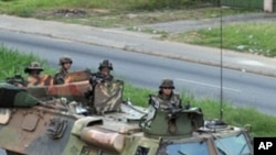 French troops patrol a street in Abidjan on April 1, 2011